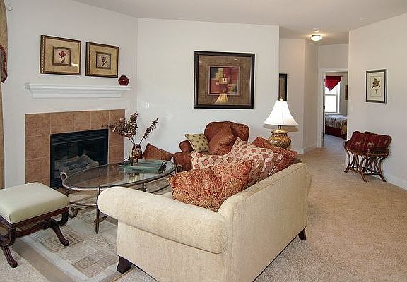 Open living room with corner fireplace