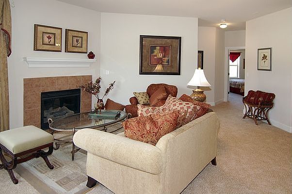 Open living room with corner fireplace