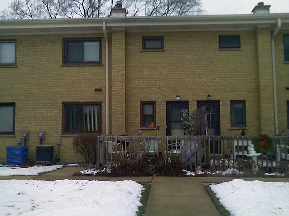 back of the unit from the parking spaces