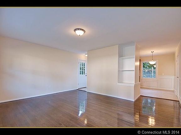 Living Room with custom bui...