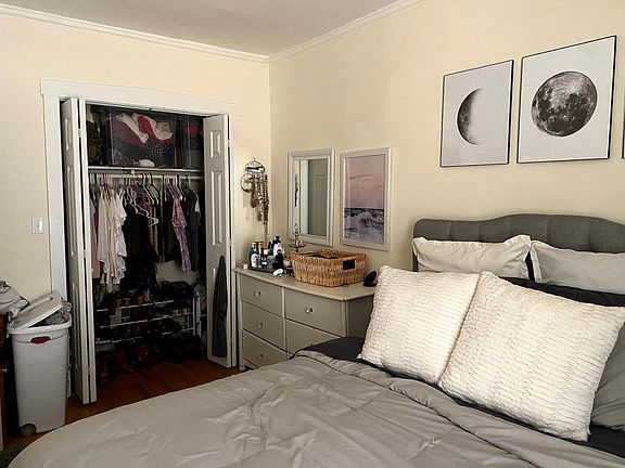 Bedroom with walk-in closet