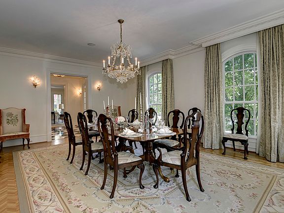 Formal Dining Room with dual French doors leading to terrace