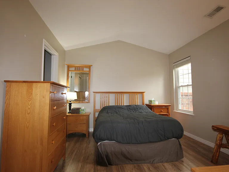 Primary Bedroom with vaulted ceilings