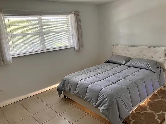 Comfortable second bedroom with plenty of light.