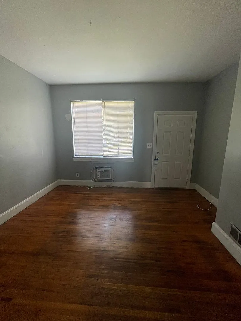 This 2 bed 1 bath duplex home is all brick located near Remount Rd and West Blvd. — Photo 3