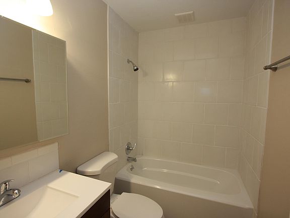 bathroom with tile surround