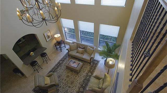 Soaring ceilings with designer lighting.