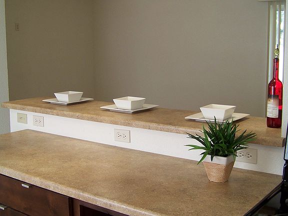 Kitchen Bar Opens to Living Rm