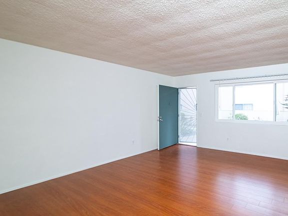 Living room with view to front door/entrance.