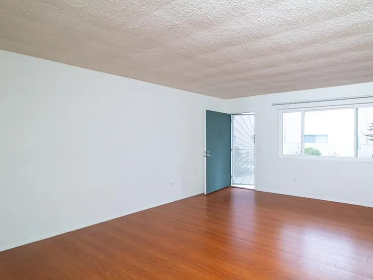 Living room with view to front door/entrance.