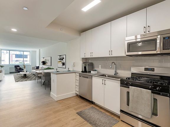 Renovated II North/South kitchen and living room with hard surface flooring