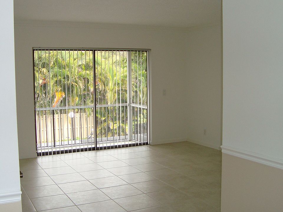 LIVING ROOM AND PATIO.