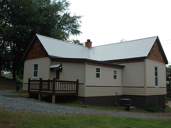 Park in rear for easy entran