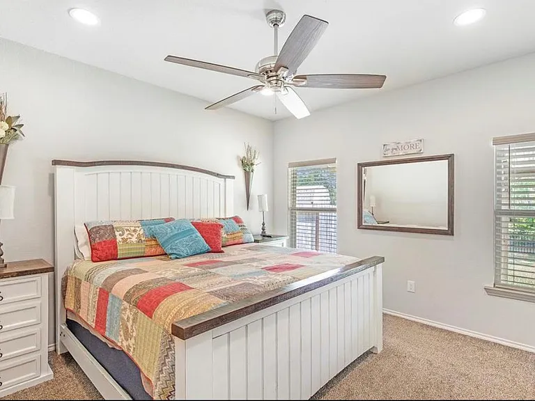 OFF THE KITCHEN, YOU'LL FIND THE MASTER BEDROOM, WITH A VIEW ONTO THE BACK DECK AND YARD :-)