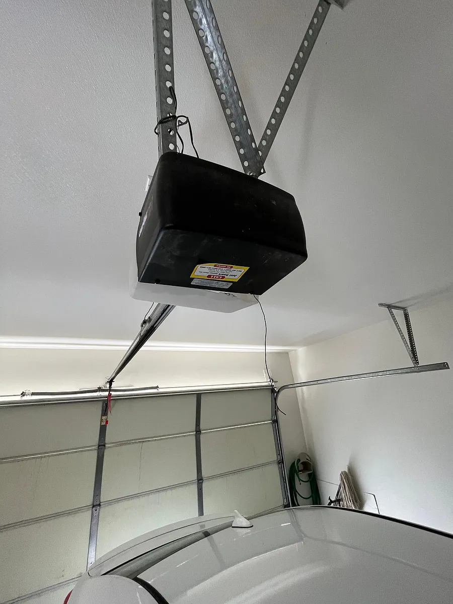 2 car garage with opener and 2 remotes and storage cabinets - 33506 Cedar Creek Ln