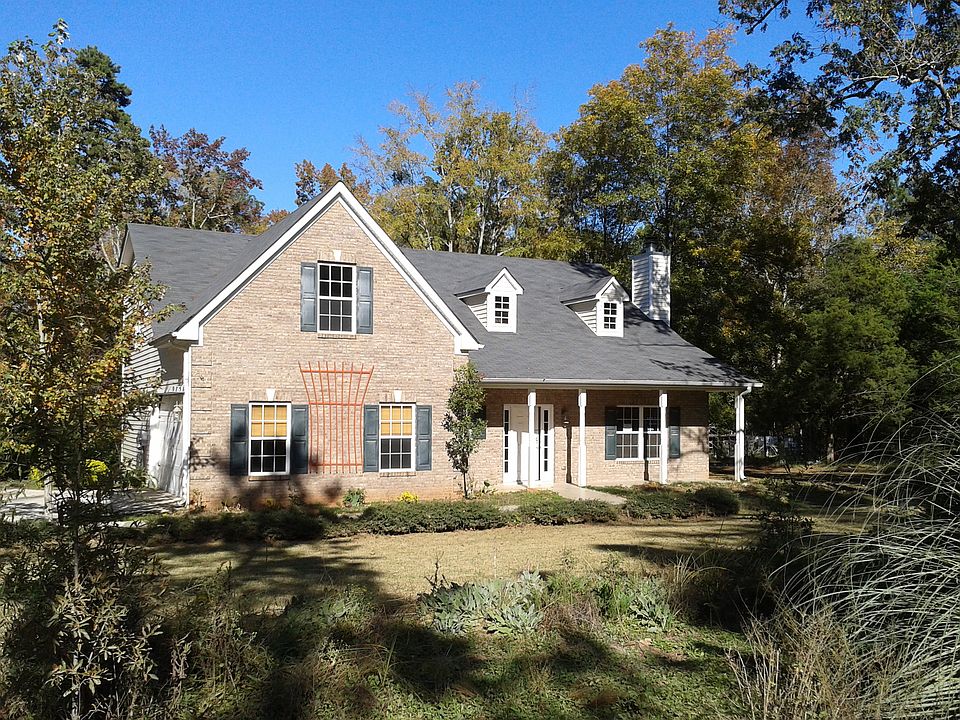 Traditional Exterior with Lots of Yard