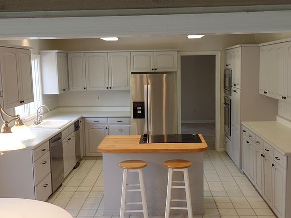 Spacious kitchen with loads of newly finished cabinetry and new appliances