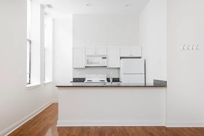 Kitchen featuring wooden floor