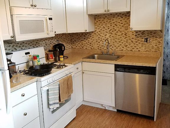 view of kitchen now with new backsplash