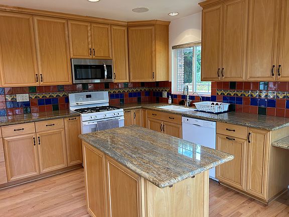 Tons of natural light in the kitchen and plenty of room for the whole family to be milling around!