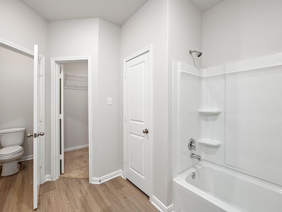 The master bathroom is large and spacious.