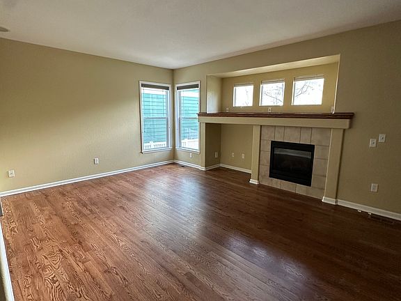 Enjoy the gas fireplace while watching movies in the living room.