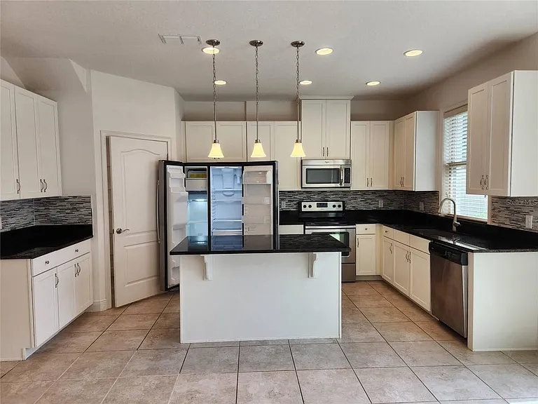 9805 Winnington St — Photo 13
