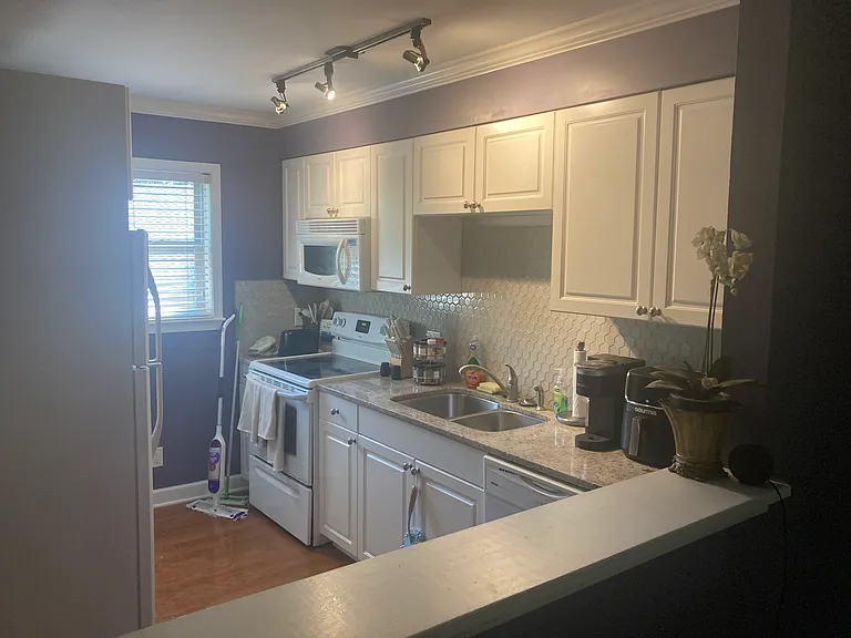 From dining area, looking through pass through to kitchen...