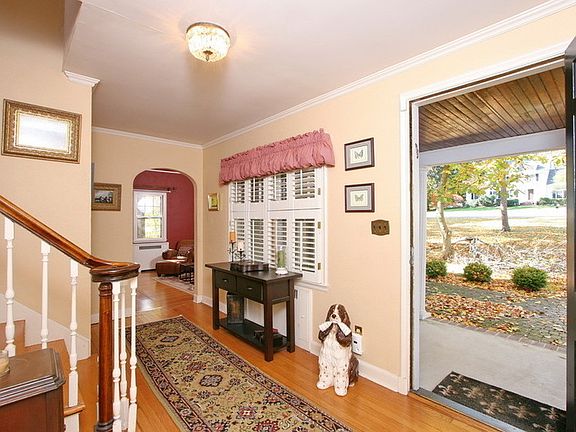 Foyer
						:
						Covered front porch to charming Foyer with plantation shutters
