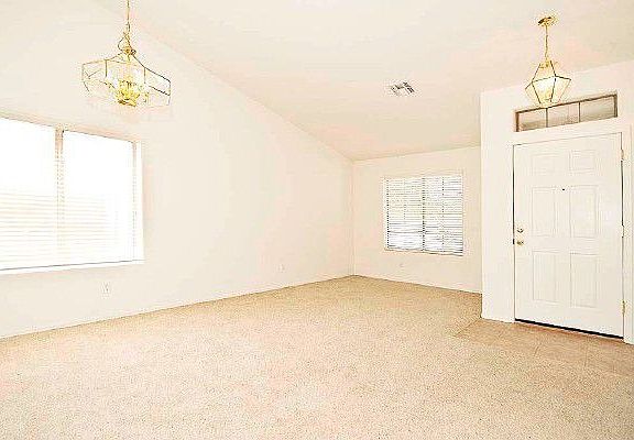 Living room, looking towards front entry
