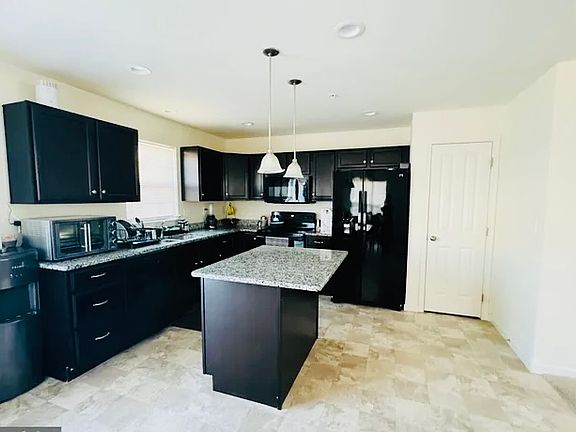 Kitchen with laminate countertop