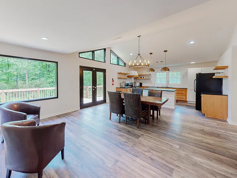 Your connection with nature begins from the living, dining and kitchen and extends to the rear deck!