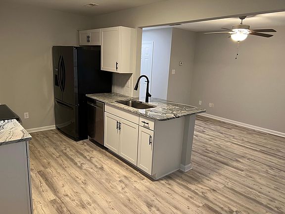 Granite extends for counter seating. All appliances, cabinets, and counters new and energy efficient.