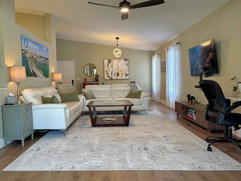 Living Area Featuring Vaulted Ceilings