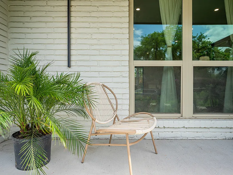 Charming patio corner perfect for morning coffee or quiet afternoon relaxation.