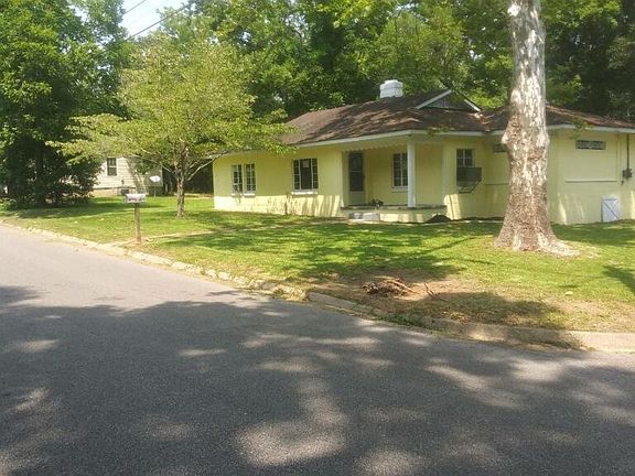 View from street before new roof and shutters...now I'm even more beautiful!