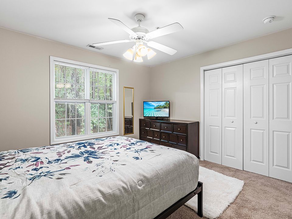Master with wooded view and large closet