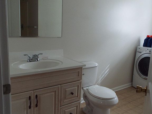 Hallway bathroom with Washer and Dryer