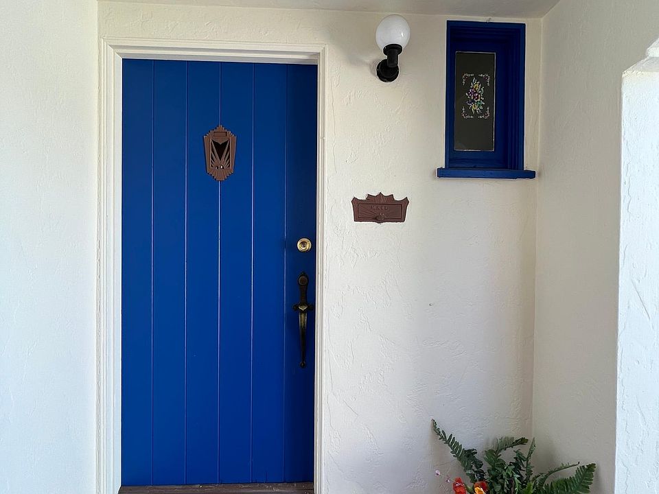 Newly painted door with a charming feel.