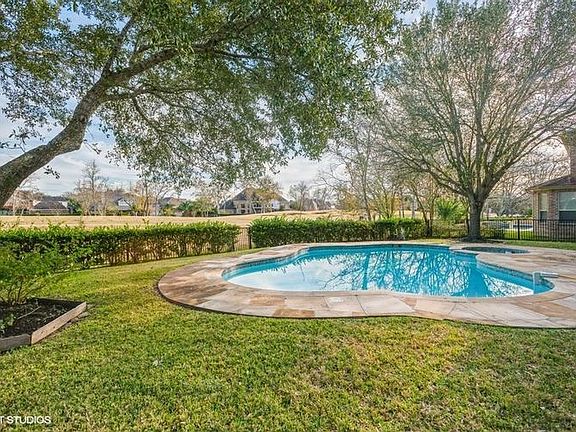 Another view of the inground pool and golf course!