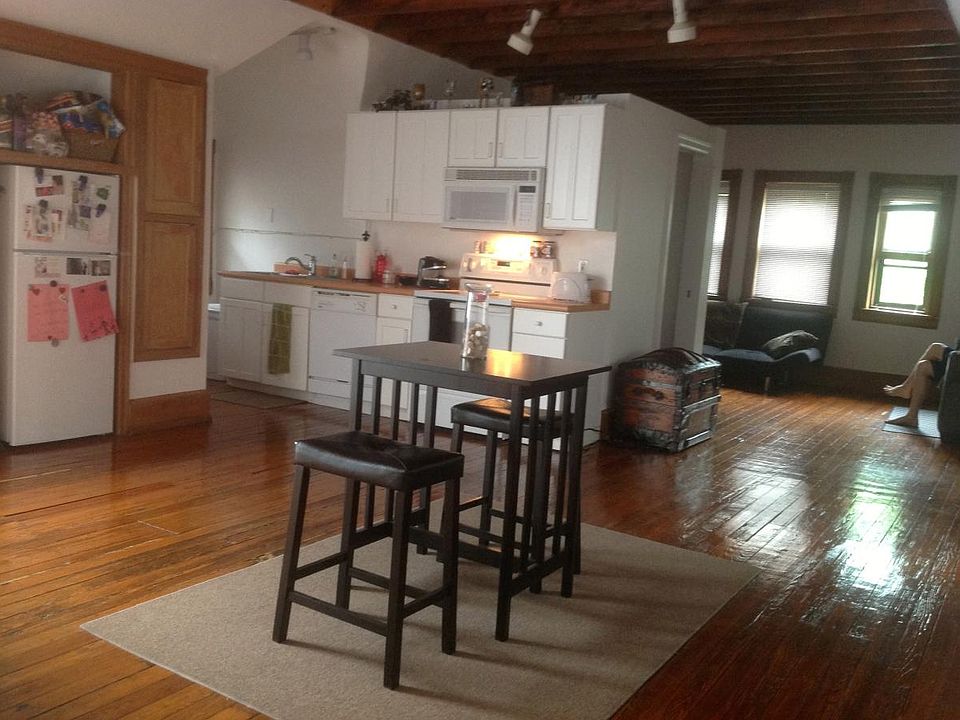 View From Bedroom to Kitchen Area Kitchen has DW, Microwave, Range, 2 Refrigerators