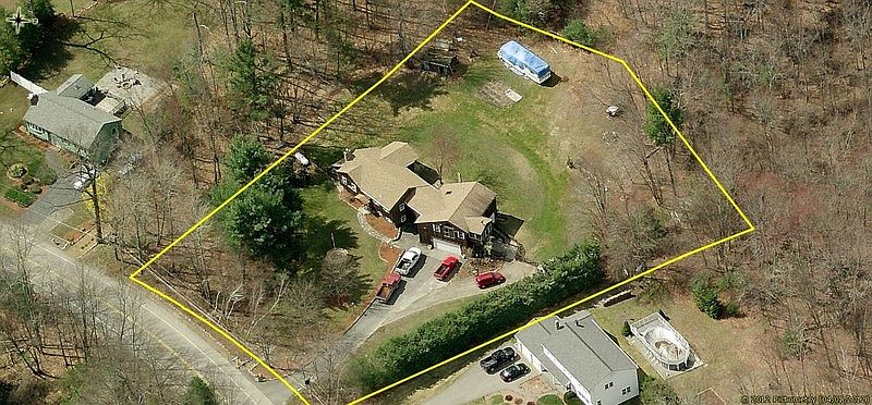 aerial view : 1.1 ac w/ pvt. well & septic. back yard abuts woods, tree barrier on both sides