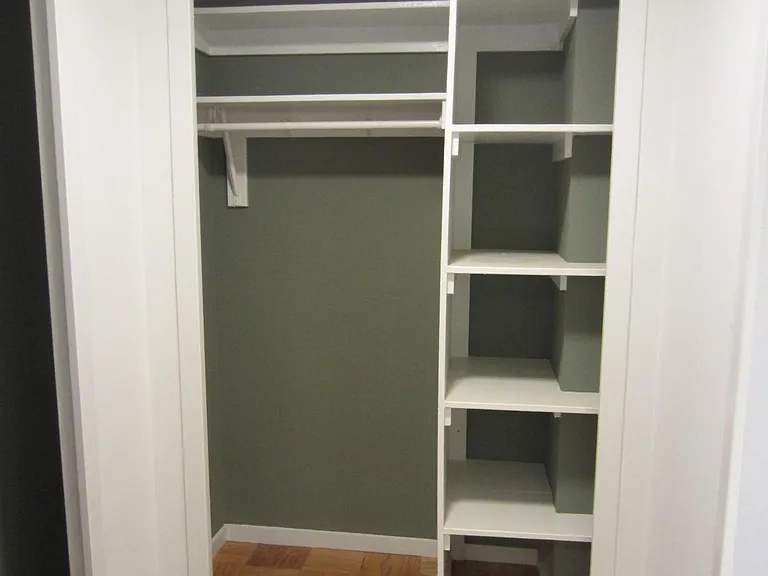 PLENTY OF CLOSET SPACE WITH SHELVINGS