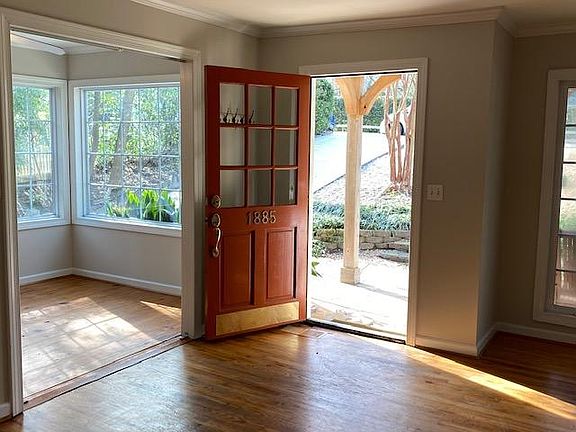 Living room, and separate office area, lots of daylight!