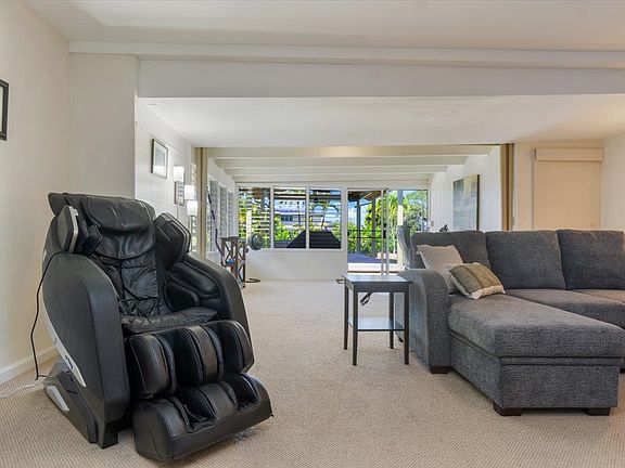 Another view of family room/theatre looking out towards flex room and backyard pavilion.