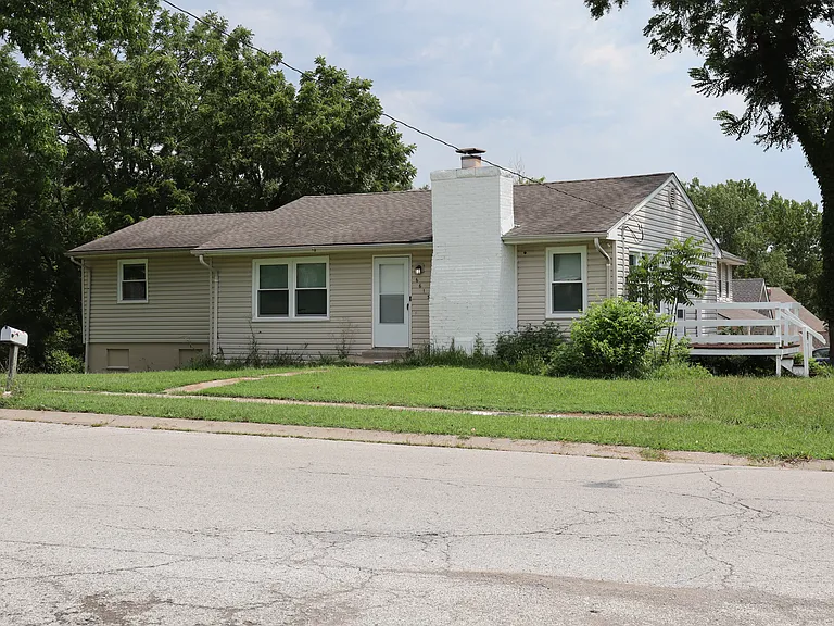 6615 N Holly St — Photo 1