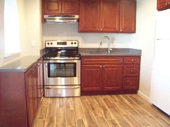 Kitchen with stainless steel gas stove