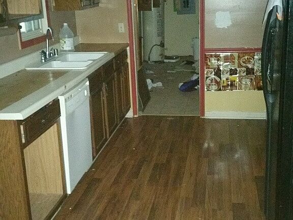 Kitchen leading into Laundry