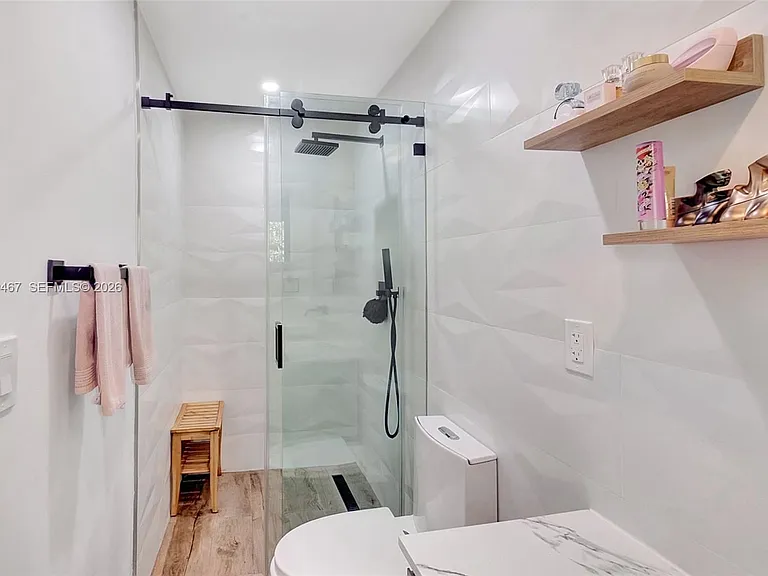 7711 Miami View Dr — Photo 24