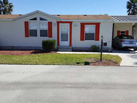 love those orange shutters!!
